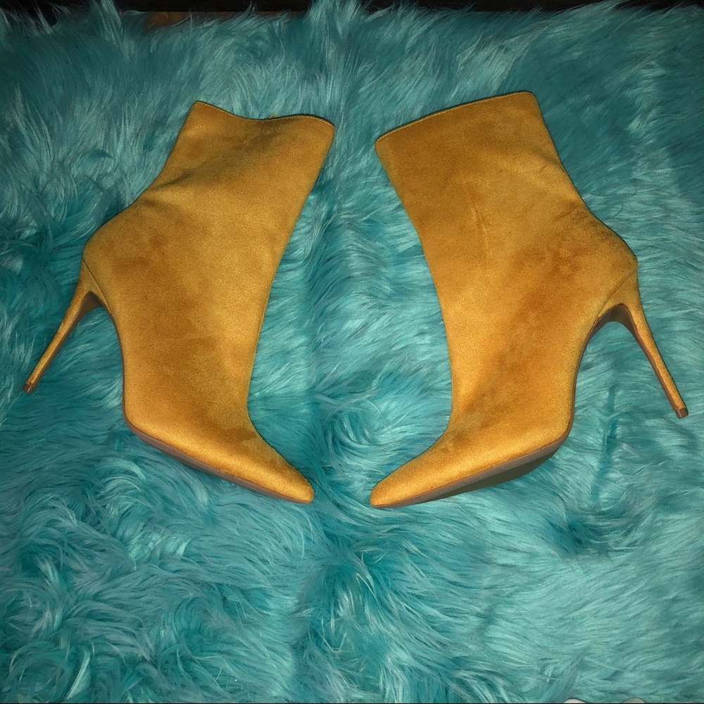 Heeled boots Mustard color